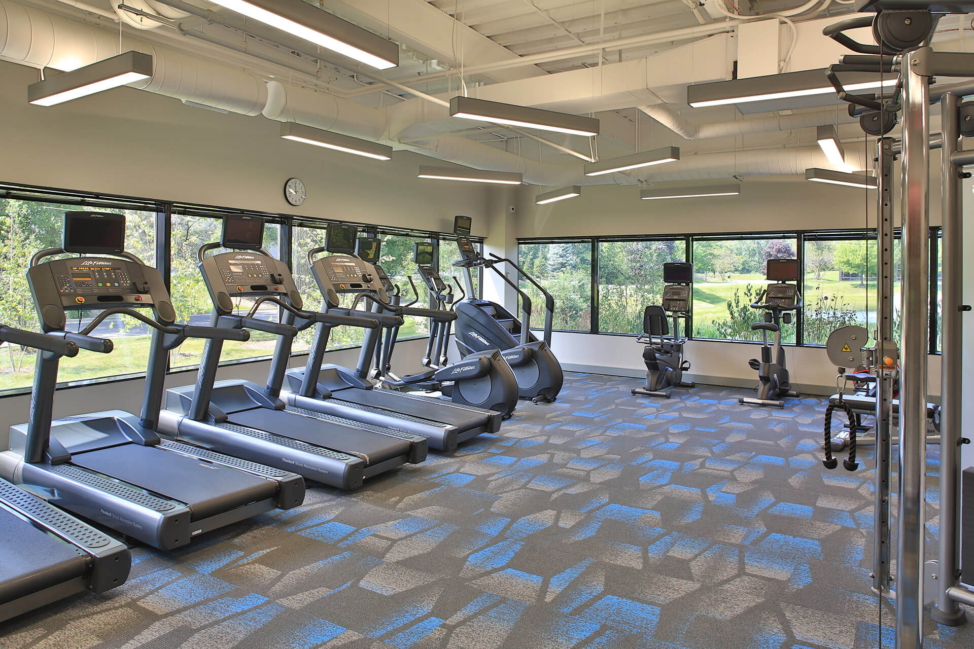 Fitness area with treadmills inside Bannockburn Lakes office complex