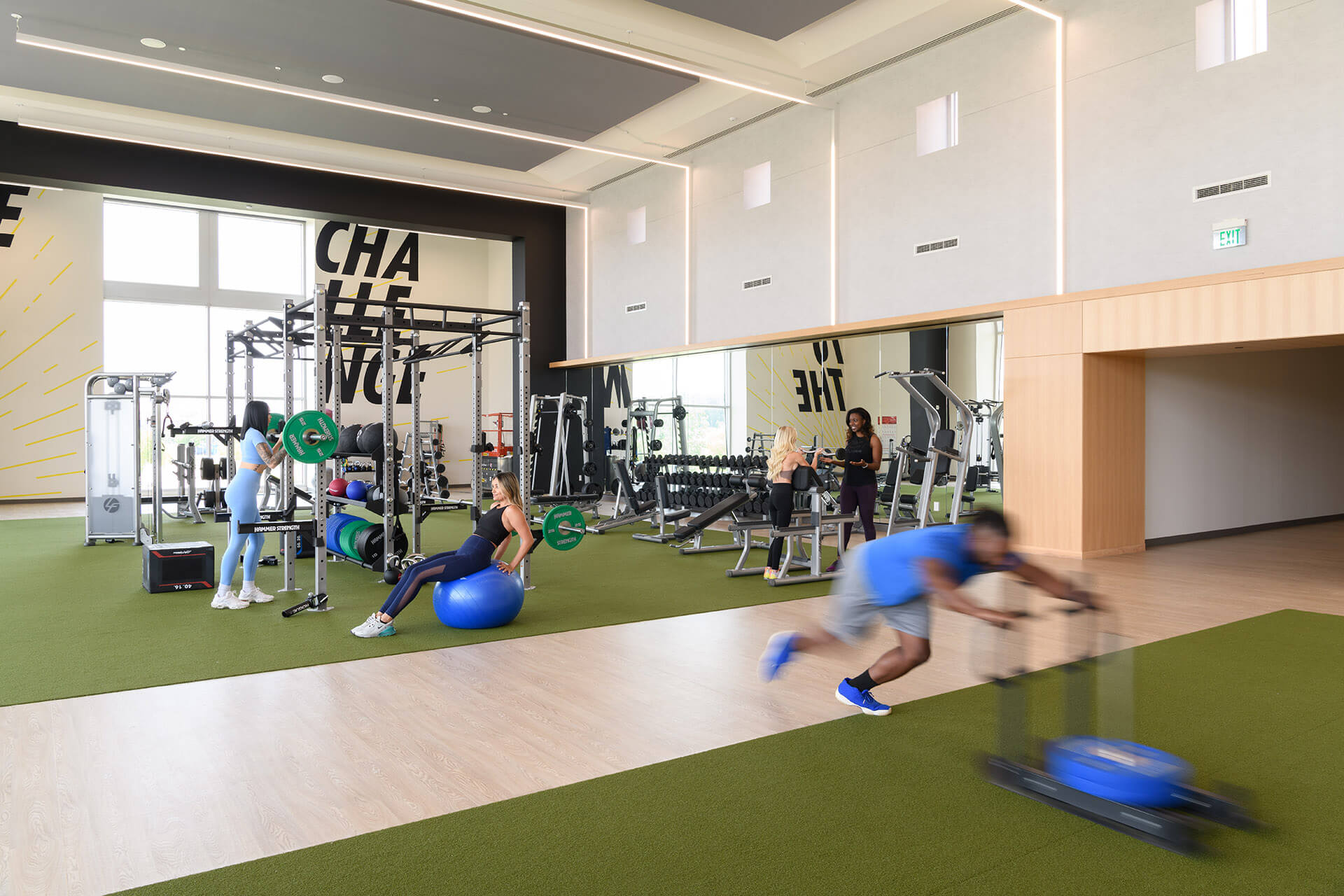 modern fitness area with free weights at the terraces